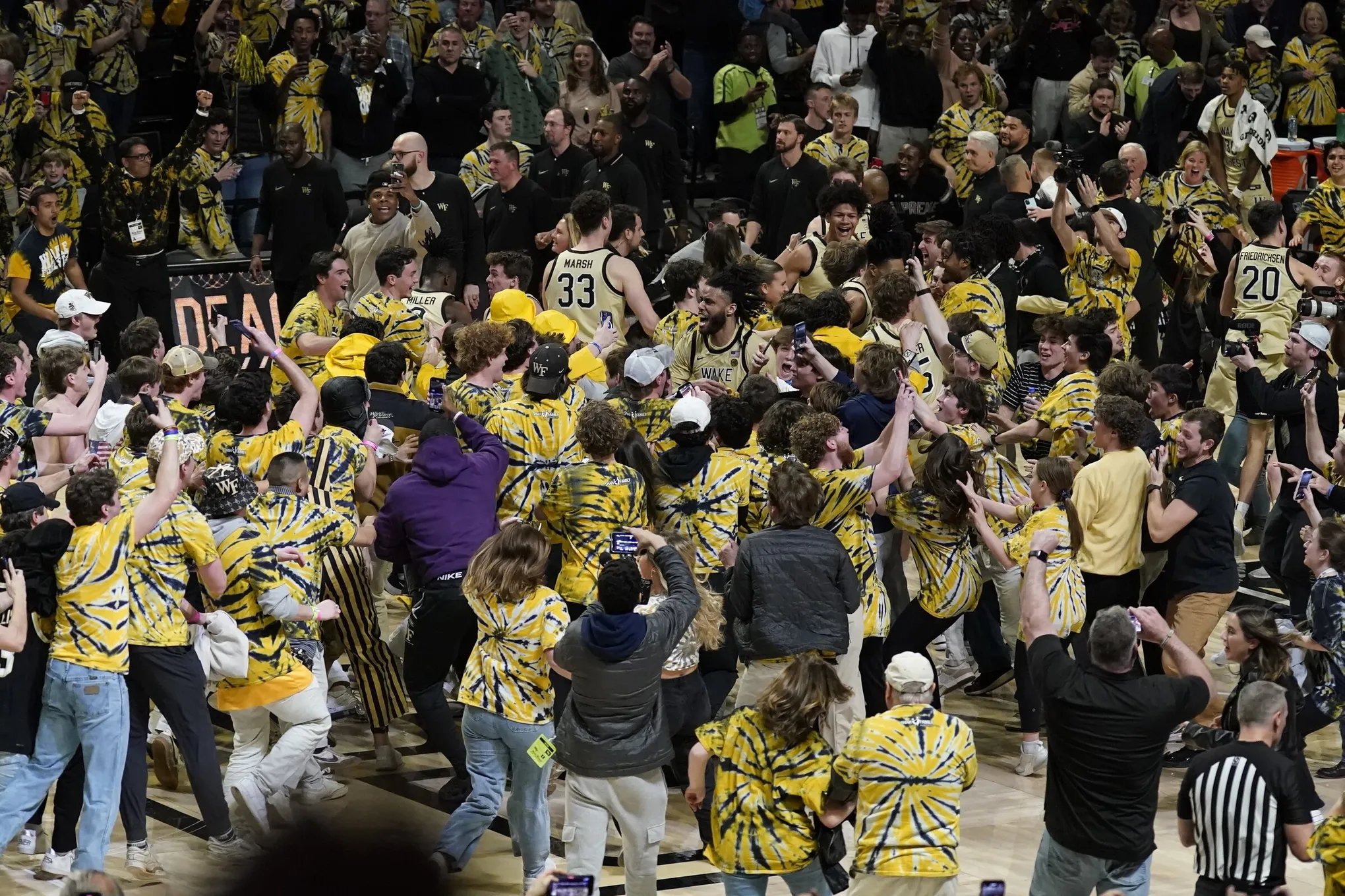 Storm blending in school basketball: Should fans be restricted from rushing floor?